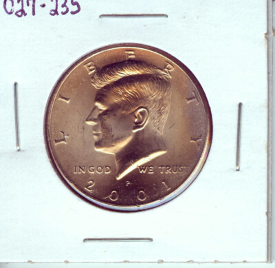 2001 Kennedy half dollar wrong planchet error showing abnormal diameter and color profile from being struck on a foreign denomination planchet